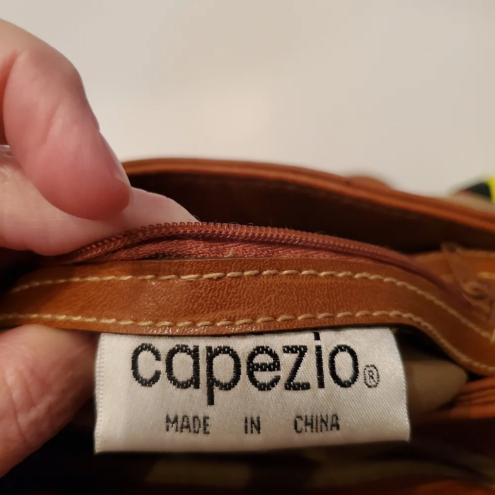 Vintage Capezio Cognac Bucket Crossbody Bag – Classic Gold Medallion